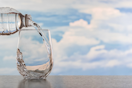 Drinking water poured into the glass.の写真素材