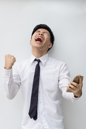 Happy business man success story in his businessの写真素材