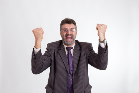 Businessmen are delighted on a white background.の写真素材