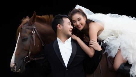 Married couple with a horseの写真素材