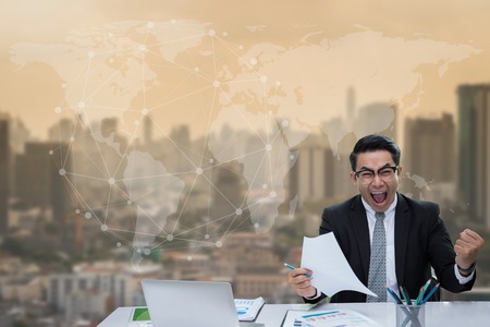 Success businessman in city and element backgroundの写真素材