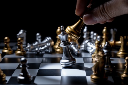 Chess board game for business concept in light and shadow.の写真素材