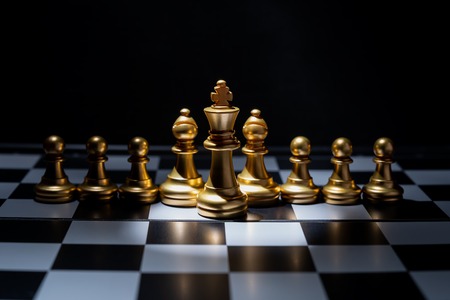 Chess board game for business concept in light and shadow.の写真素材