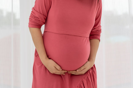 Pregnant women feel back pain and discomfort.の写真素材