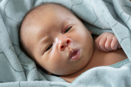 Close up of Asian newborn babyの写真素材