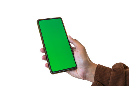 hand holding phone mobile green screen isolated on white backgroundの写真素材