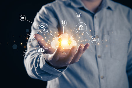 Human hand holding cloud computing diagram show on hand. Cloud technology. Data storage. Networking and internet service concept.の写真素材