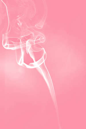 Pink background that I feel happy and warm.の写真素材