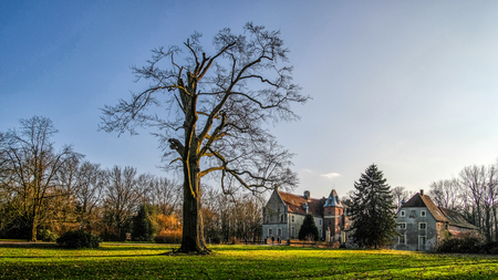 Senden, Coesfeld, Musterland December 2017 - Watercastle moated castle sending during sunny day in winterのeditorial素材