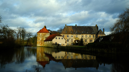 Historic Water Castle "Schloss Tatenhausen" in Kreis Guetersloh, North Rhine-Westphalia, Germanyのeditorial素材