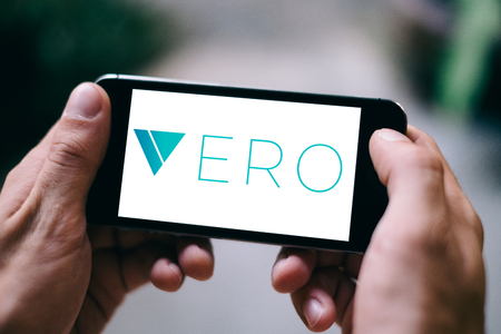 COLOGNE, GERMANY - MARCH 13, 2018: Closeup of iPhone Screen with VERO SOCIAL APP LOGO or ICONのeditorial素材