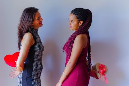 Exchanges of gifts between mother and beautiful daughter. - imageの写真素材