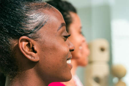 Multi-ethnic beauty. Different ethnicity women. Latin, african and asian faces. Racism and friendship concept.の写真素材