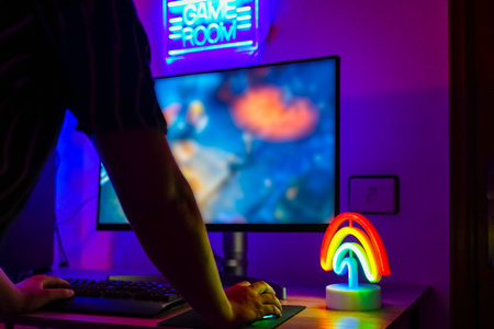 Young gamer playing online. The best game for the computer. New technology game trends and...