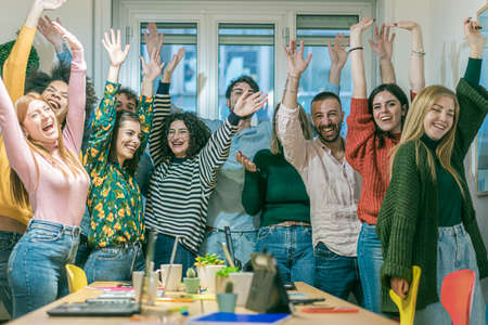 Happiness, smart working and people concept. International group of happy smiling men and women...