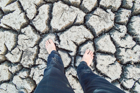 tread Dry and cracked earth の写真素材