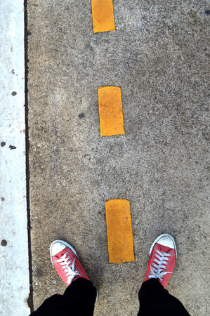 Two legs on the train waiting wayの写真素材