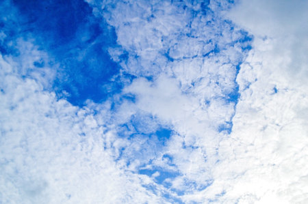 Blue sky with clouds の写真素材