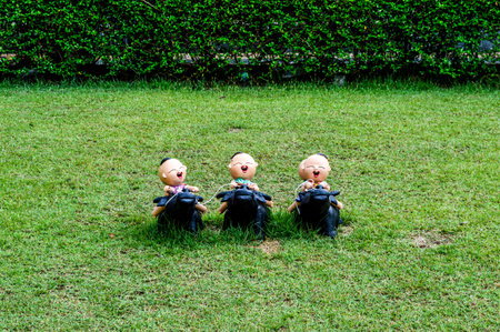 doll riding the buffalo in garden