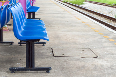 blue chair in train stationの写真素材