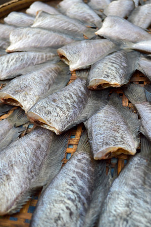 closeup of dried trichogaster fish at the market 