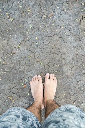 Two legs man on the soil groundの写真素材