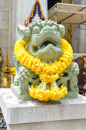 stone Chinese Lion in temple thailandの写真素材
