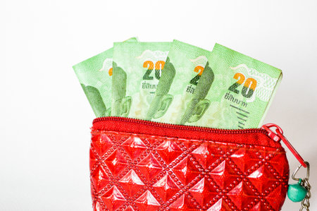 Money in my bag on white backgroundの写真素材