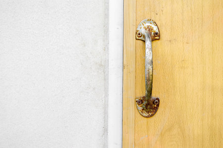 Door handles and wood doorの写真素材