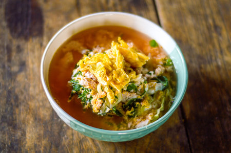 boiled rice soup with omeletteの写真素材