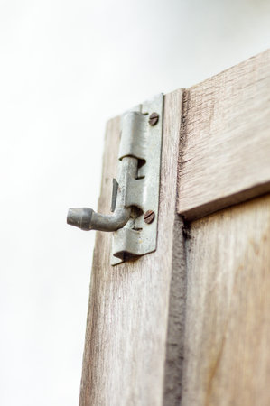 old latch on wooden windowの写真素材