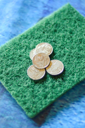 money on green Scotch-Brite