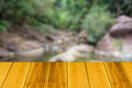 wooden bridge on the waterfallの写真素材