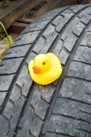 yellow plastic duck doll tiresの写真素材