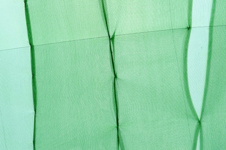 Green shading net on the roof of green houseの写真素材