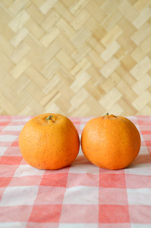 oranges on tableclothの写真素材