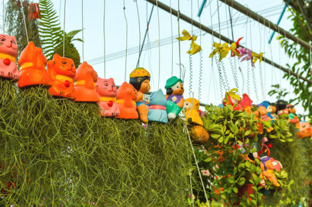 Spanish moss tree and pot hanging in gardenの写真素材