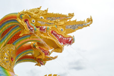 12 December 2014 - Gold King of Nagas statue in Wat Saman Rattanaram, Chachoengsao, Thailandのeditorial素材