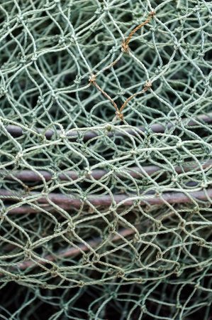 Closeup of a fishing netの写真素材
