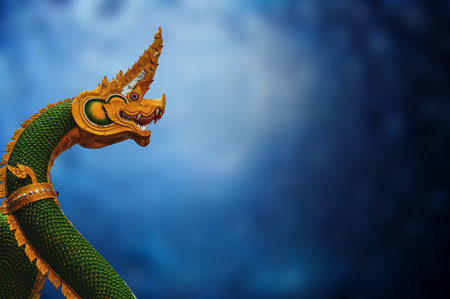 King of Naga statue on blur blue backgroundの写真素材