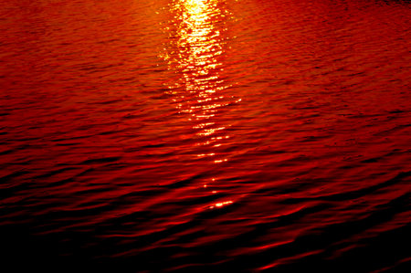 water surface in sunsetの写真素材