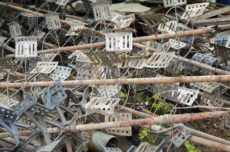 steel water turbine blades on ground in garden