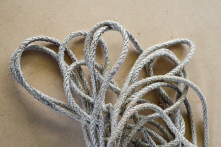old rope on wood plank