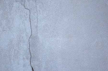crack cement wall texture backgroundの写真素材
