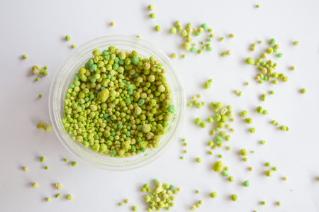 fertilizer pellets on white backgroundの写真素材