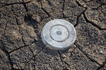 circle plastic on crack soilの写真素材