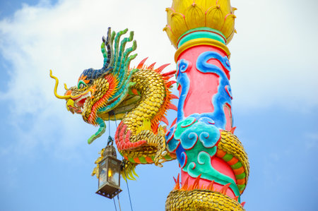 Chinese dragon statue art on postの写真素材