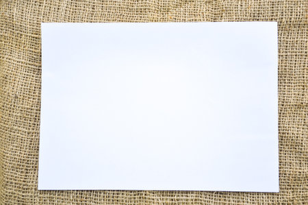 white paper on old fabricの写真素材