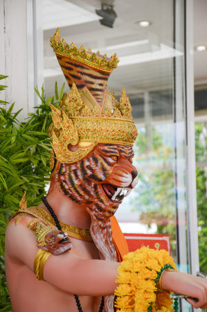 CHACHOENGSAO ,THAILAND - December 1 : beautiful monk have tiger face statue in wat Saman Rattanaram on December 1, 2015 in Chachoengsao, Thailandのeditorial素材