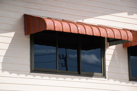 Rainproof awning of slide window